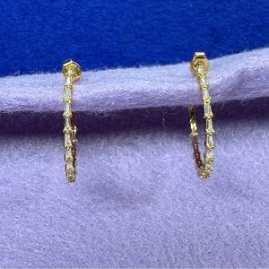 Gold tone and Crystal Hoop earrings.